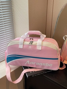 Pink multi-functional travel fitness bag with shoulder strap and stylish graphic design