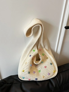 Chic knit hobo bag in cream white with colorful beads for beach and summer vacations