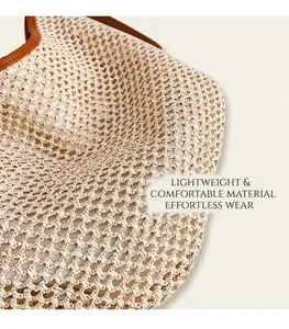 Détail du tissage en maille avec bordure en cuir marron sur le sac de plage