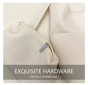 Nahaufnahme der cremefarbenen Tasche aus Leder mit Lychee-Narbe und silbernen Metalldetails