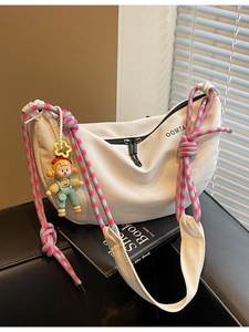 Bolso de Hombro de Lona para Mujer Minimalista Forma Dumpling Bandolera Moda Correa Anudada Casual Viaje Con Muñeco