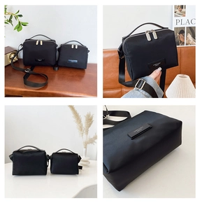 Comparaison détaillée de deux tailles de sacs bandoulière en nylon noir à double zip