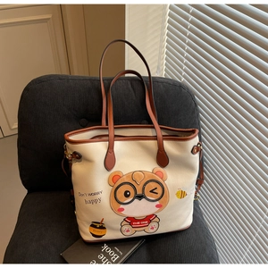 Close-up of the cute bear print and textured finish on a large capacity tote bag