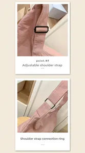 Detail of adjustable shoulder strap and metal connection rings on a pink nylon bag
