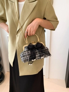 Elegant black and white tweed shell bag with mesh bow and pearl charms for women