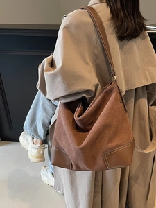 Vintage brown suede tote bag with leather patchwork and white contrast stitching detail