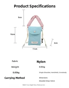 Blue quilted phone bag dimensions: 11x16x2cm with pink 'Have a nice day' handle