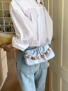 Light blue ruched cloud bag with marble texture beaded chain and leather shoulder strap