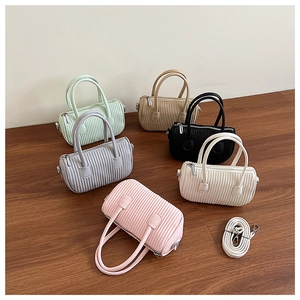 Collection of pleated cylinder handbags in six colors with detachable shoulder straps