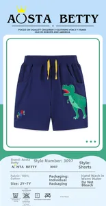 Détail d'un short en coton bleu marine avec broderie dinosaure et cordon jaune pour garçon