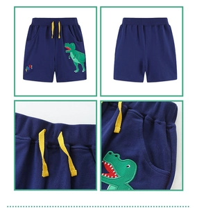Détails du short bleu marine pour garçon avec broderie dinosaure et cordon jaune