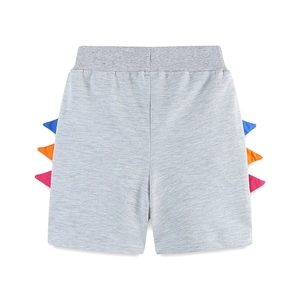 Light gray knit cotton boy shorts featuring colorful 3D dinosaur spine spikes on sides