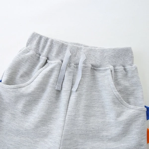 Boys knit shorts in grey marl with elastic waistband, drawstring and side pocket details