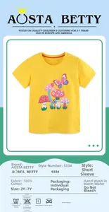Detail of yellow cotton kids t-shirt showing 100% cotton label and mushroom print