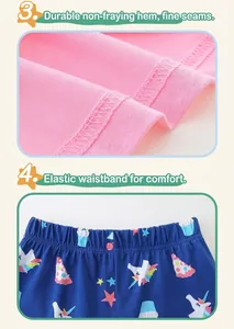 Dettaglio dell'orlo rosa e della vita elastica con pantaloncini con stampa unicorno
