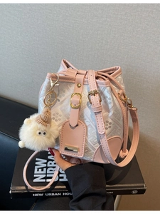 Women's pink and white colorblock bucket bag with floral jacquard and sheep charm