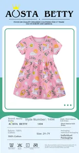 Detailed view of girls' cotton dress featuring colorful unicorn and celestial print patterns