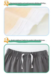 Détail des coutures renforcées et de la taille élastique avec cordon sur l'ensemble en coton