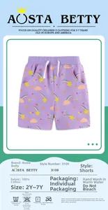 Detail of purple cotton girl shorts with colorful rainbow stars and drawstring waist