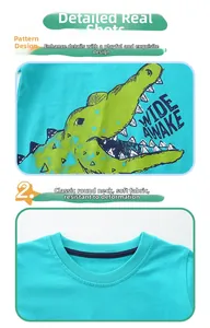 Detailaufnahme des Jungen-T-Shirts mit Krokodil-Print und weichem Rundhalsausschnitt