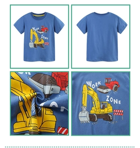 Close-up of cotton fabric and construction truck prints on navy boys' T-shirt