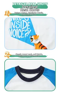 Detail of soft cotton crew neck and cartoon tiger print on boy's white raglan t-shirt