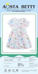Close-up of 100% cotton girls' dress with unicorn print and size chart details