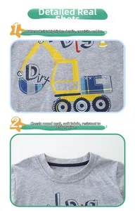 Detail view of the embroidered cartoon excavator pattern and crew neck of this gray kids shirt