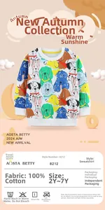 Detail view of 100% cotton kids sweatshirt featuring colorful cartoon dog print patterns