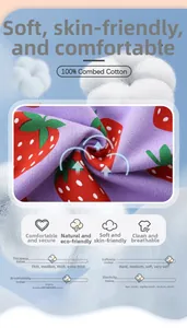 Detail of 100% combed cotton fabric with purple strawberry print for girls' sweatshirt