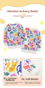 Detail of white cotton girls sweatshirt with colorful cartoon animal print and ribbed cuffs