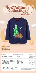 Detail view of cotton long sleeve kids t-shirt featuring glowing Christmas reindeer print