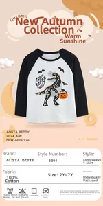 Detail of 100% cotton boys' Halloween raglan tee with dinosaur and bat graphic print