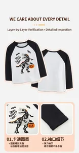 Detail of Halloween boy's raglan sleeve shirt with cartoon dinosaur and pumpkin prints