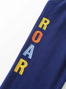Boys navy cotton knit joggers featuring colorful ROAR 3D embroidery detail