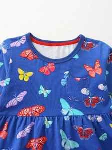 Robe fille en coton bleu marine avec imprimés papillons colorés et petite poche poitrine