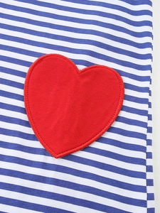 Girls striped cotton dress featuring blue white stripes and a red heart pocket detail