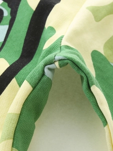 Close-up of boys' camo sweatshirt fabric showing high-quality stitching and cotton knit texture