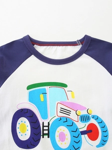 Boys white raglan long sleeve T-shirt featuring a colorful cartoon tractor graphic print