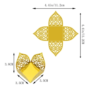 Detail view of laser-cut gold wedding favor box dimensions: 3.5x3.5x3.8 cm when folded