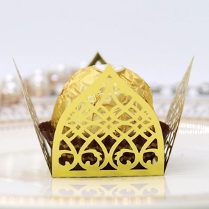 Detailed laser-cut gold lace favor box for weddings with elegant hollow floral pattern