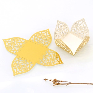 Detailed laser cut patterns on pink pearl paper wedding favor box for candy and gifts