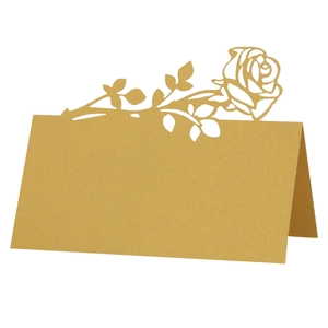 Golden laser-cut rose place card in pearlescent paper for wedding table decor