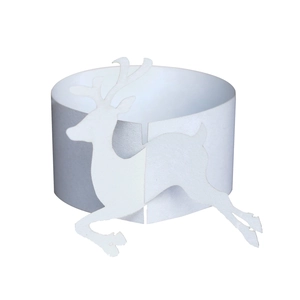 Intricate laser-cut reindeer cupcake wrapper made of white pearlescent textured paper