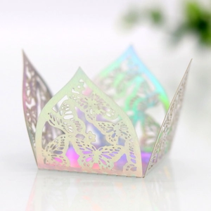 Macro detail of laser-cut butterfly candy box with iridescent holographic finish