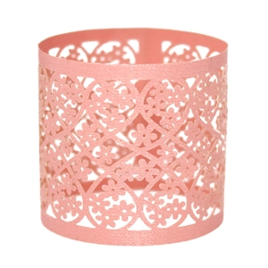 Detailed laser-cut pink pearlescent paper napkin ring with floral hollow pattern