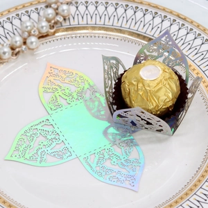 Detailed laser-cut butterfly hollow pattern on iridescent paper candy box holder