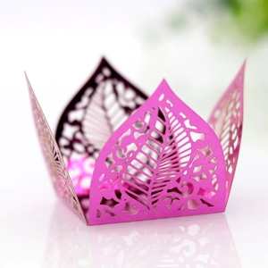 Detailed laser-cut hollow leaf patterns on a purple metallic shimmer candy box wrapper