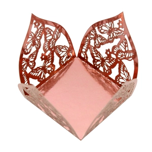 Detailed laser-cut butterfly lace design on rose gold metallic wedding favor candy box