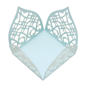 Detail showing laser-cut lace pattern on light blue paper wedding favor gift box